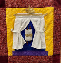 quilt square depicting an open Ark with Torah inside